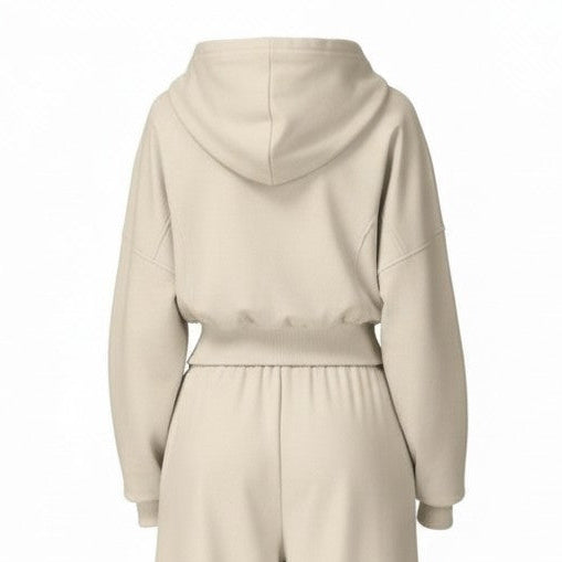 Beige tracksuit with hoodie and pants on a white background